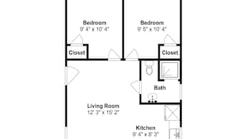 Un plan d’étage comprenant deux chambres, un salon, une cuisine et une salle de bain.
