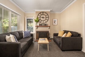 Smart TV, fireplace, DVD player, books