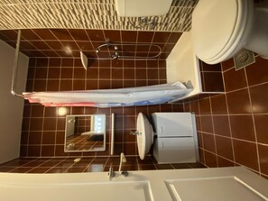 Badekar, hårføner og håndklær