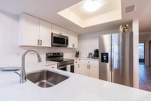 Fridge, microwave, oven, stovetop - Backyard & patio retreat near Cocoa Beach Pier (Cocoa Beach)