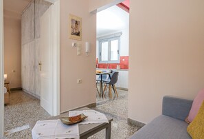 City Apartment | Living area | 40-inch TV with satellite channels