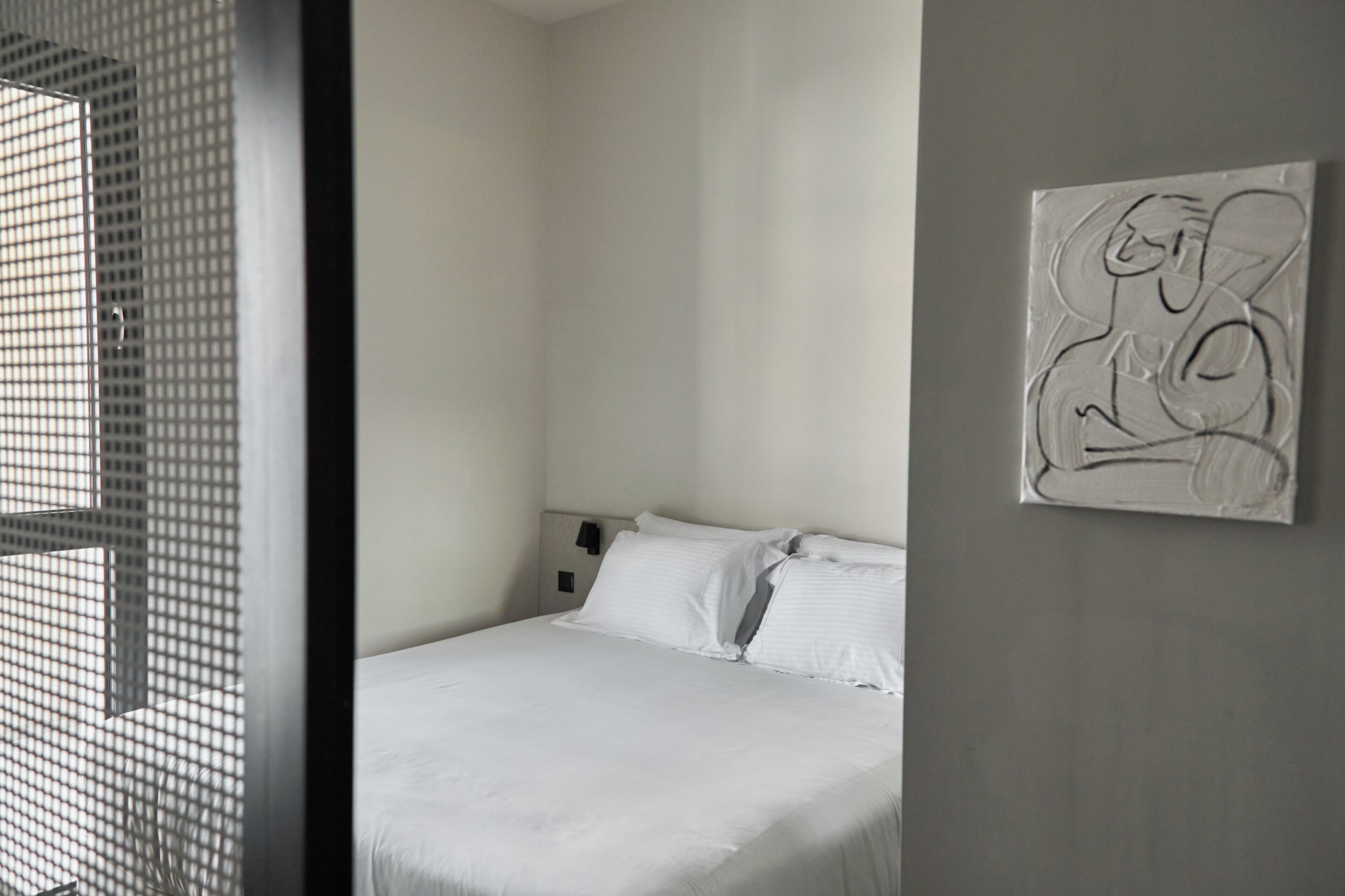 Pillowtop beds, in-room safe, blackout drapes, soundproofing