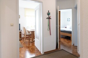 1 bedroom, travel crib, bed sheets