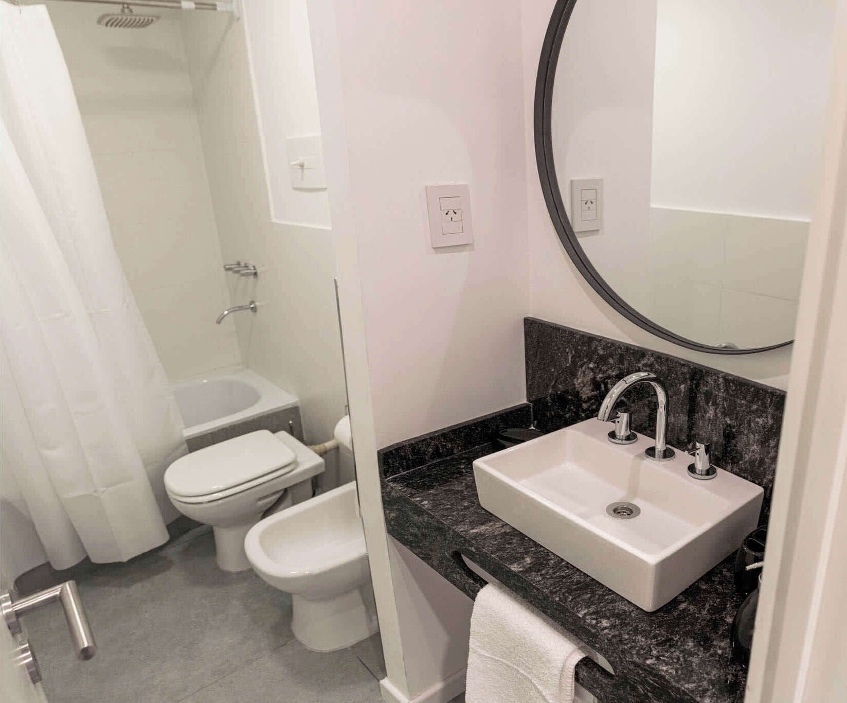 Shower, hair dryer, towels, shampoo