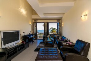 City Apartment | Living area | 45-inch flat-screen TV with satellite channels, TV - George's Poet Maisonette (Rethymno)