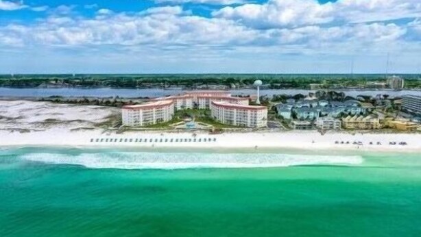 A coastal hotel with multiple buildings, a beach, and a clear view of the ocean. - 454 El Matador 1 Bedroom Condo by RedAwning (Fort Walton Beach)