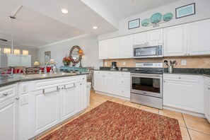 Condo, 3 Bedrooms | Private kitchen | Fridge, oven, coffee/tea maker