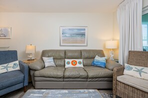 Condo, 2 chambres | Aire de séjour