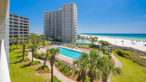 A hotel with a pool, beach, and ocean view. - Seaside Beach & Racquet 4407 3 Bedroom Condo (Orange Beach)