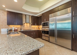 Condo, 3 Bedrooms | Private kitchen | Fridge, oven, coffee/tea maker