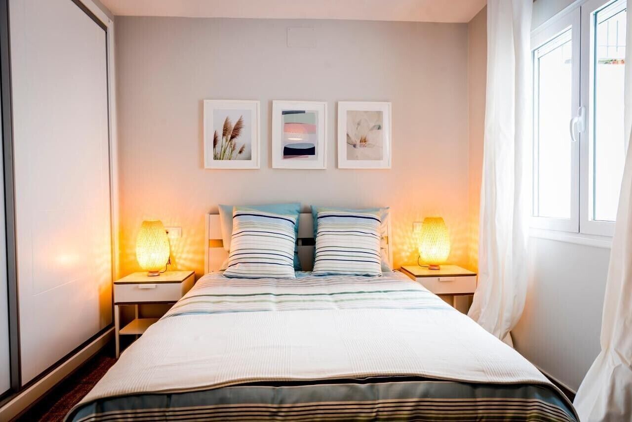 1 dormitorio, tabla de planchar con plancha, wifi gratis y ropa de cama