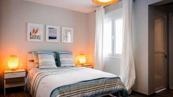 1 dormitorio, tabla de planchar con plancha, wifi gratis y ropa de cama