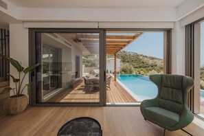 Luxury Villa | Living area | 45-inch Smart TV with satellite channels, TV - Luxury 2S villa Alpha with private pool (Igoumenitsa)