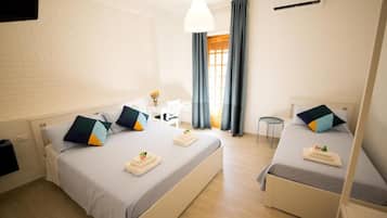 Comfort Triple Room | Hypo-allergenic bedding, desk, laptop workspace, iron/ironing board