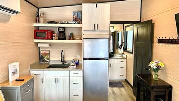 Fridge, microwave, coffee/tea maker, toaster