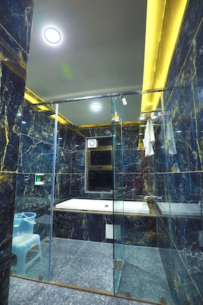 Sea View Suite Room | Bathroom | Free toiletries, slippers, towels, soap