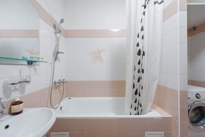 Hair dryer, towels, soap, shampoo