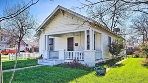 A single-story house with a porch, a satellite dish, and a small front yard. - Georgetown Vacation Rental Close to Town Square! (Georgetown)