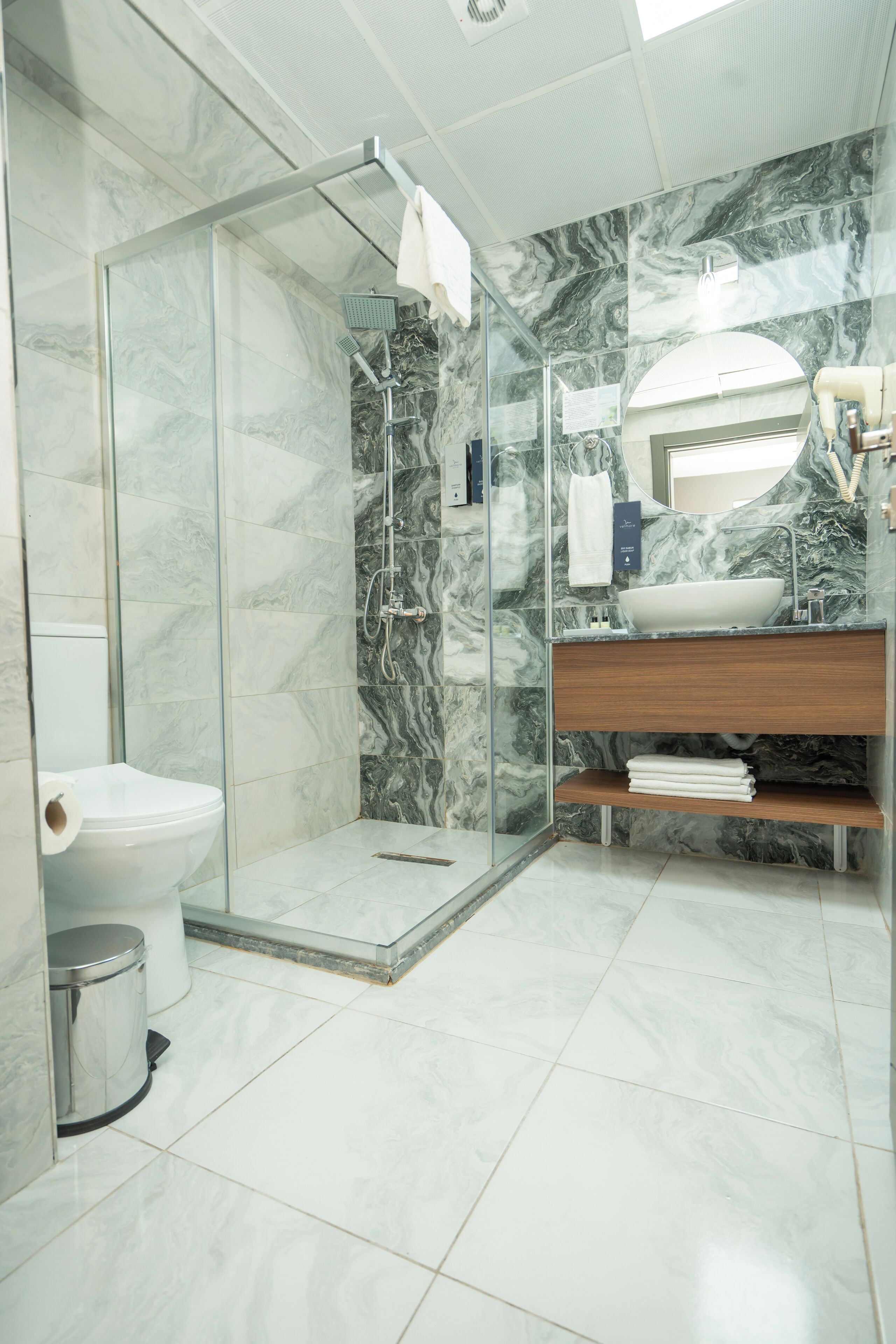 Hair dryer, slippers, towels, soap