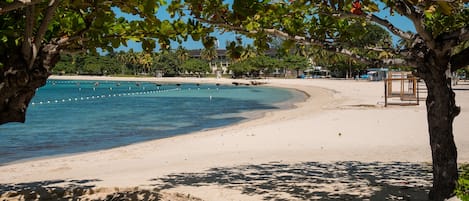 On the beach, white sand