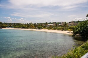 On the beach, white sand - Emerald Corner at Fishermans point (Ocho Rios)