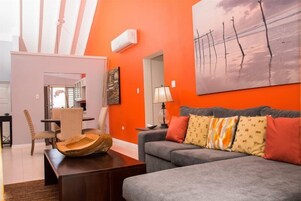 Deluxe House | Living area | 40-inch LED TV with cable channels, TV, Netflix