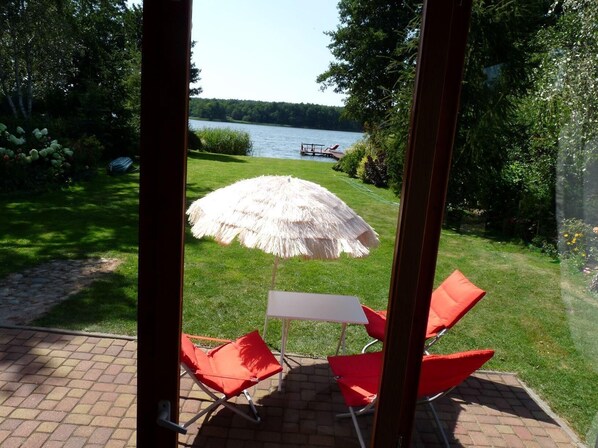 Terrace/patio - A romantic holiday home with its own beach (Rózansko)