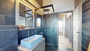 Bathtub, hair dryer, towels