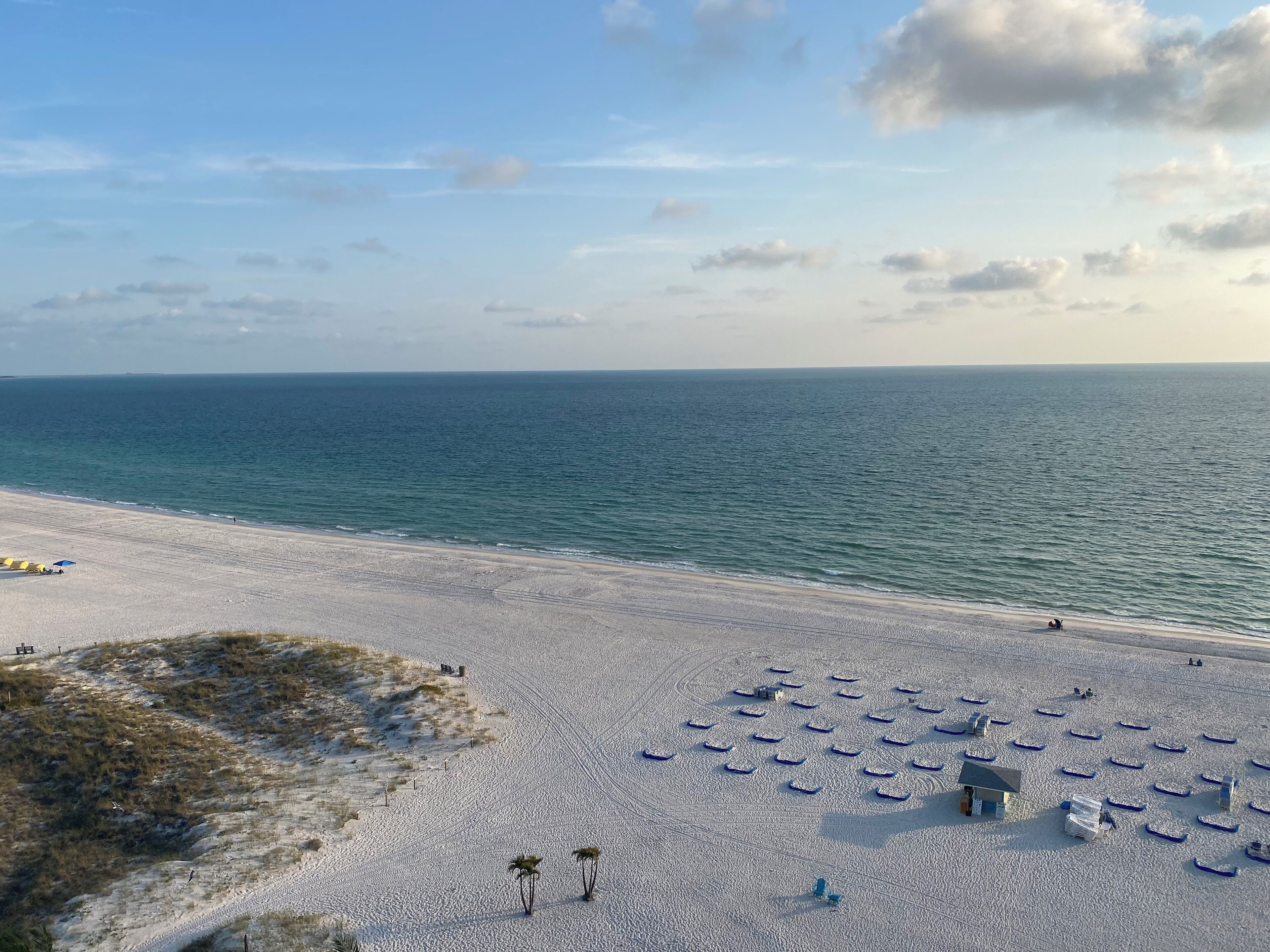 On the beach, sun loungers, beach towels