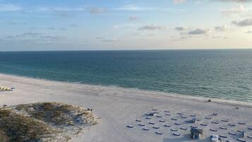 On the beach, sun loungers, beach towels