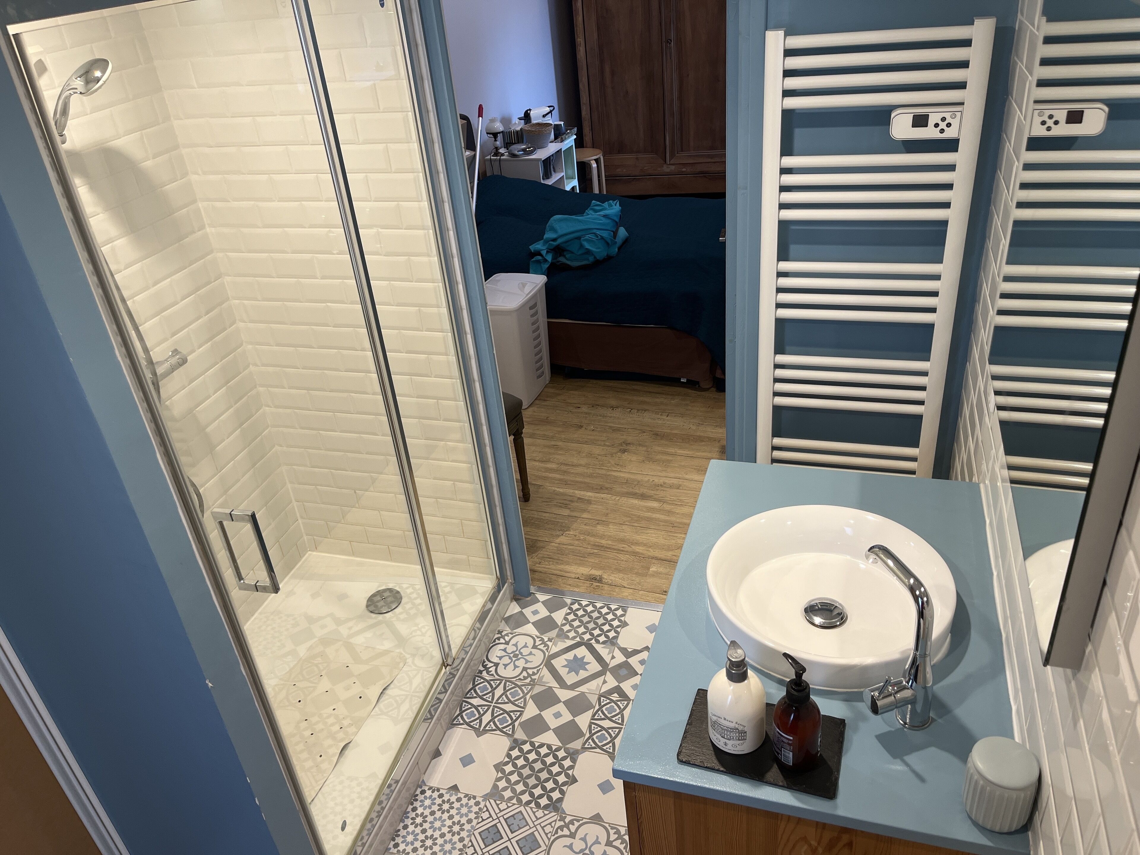 Shower, hair dryer, towels, soap