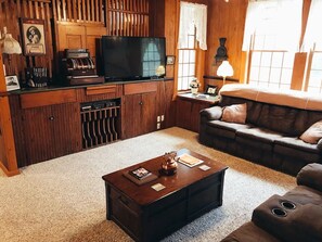 Smart TV, fireplace, DVD player, books