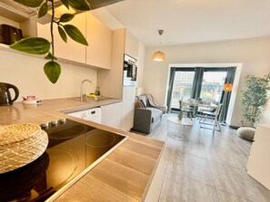 Apartment, 1 Schlafzimmer | Eigene Küche | Kühlschrank, Ofen, Herdplatte, Wasserkocher