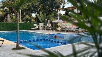 Outdoor pool, open 8:00 AM to 9:00 PM, pool umbrellas, pool loungers