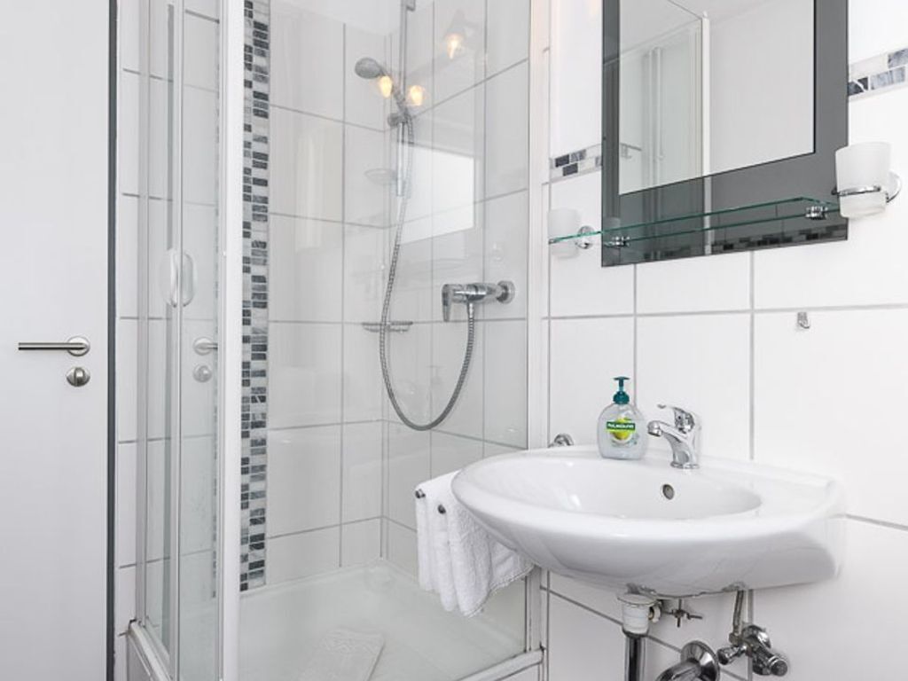 Een douche, handdoeken