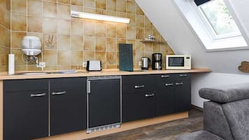 Microwave, stovetop, coffee/tea maker, electric kettle