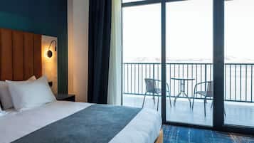 Premium bedding, memory-foam beds, in-room safe, desk