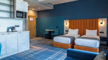 Premium bedding, memory-foam beds, in-room safe, desk