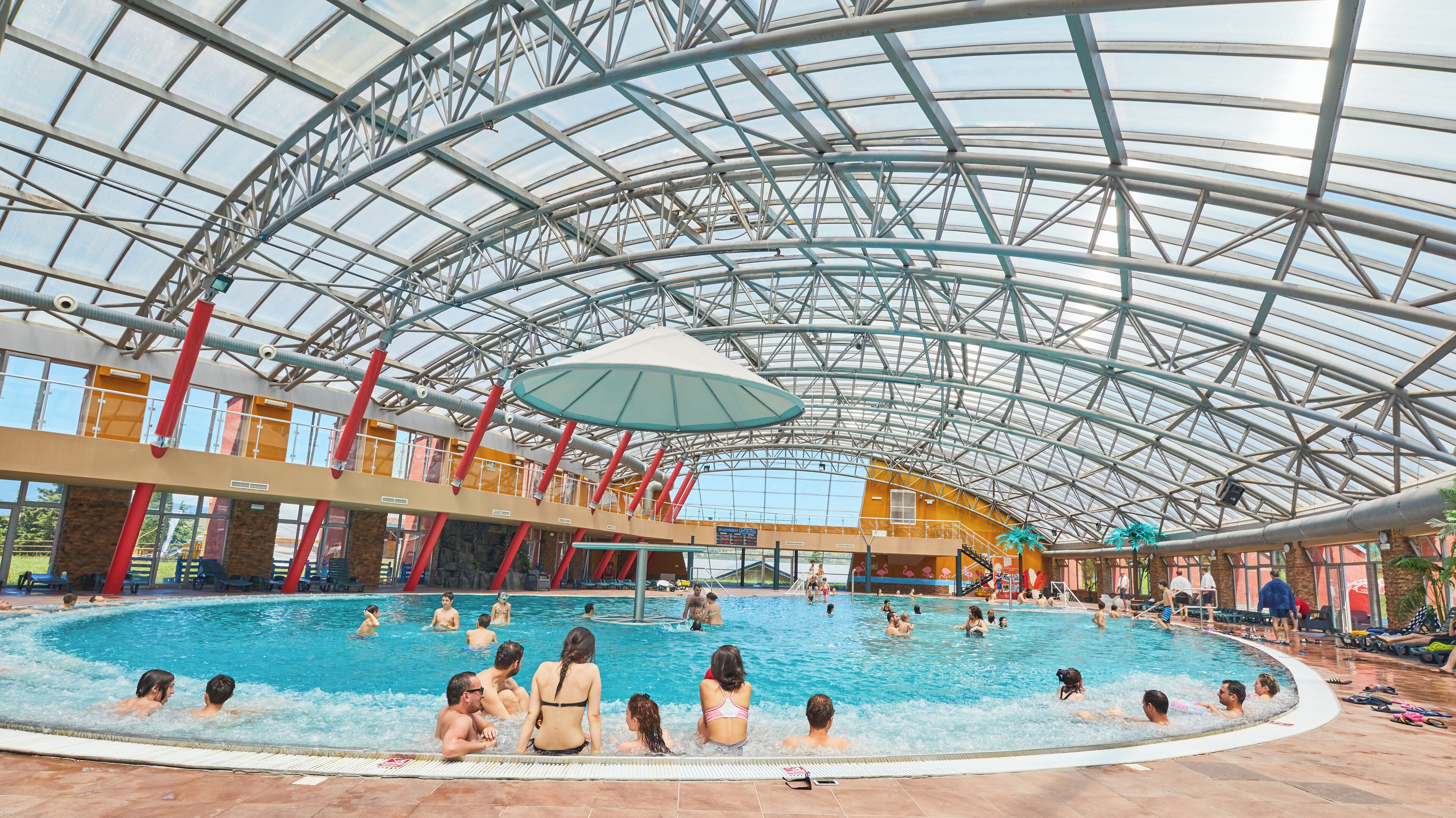 Premium bedding, desk, laptop workspace, soundproofing