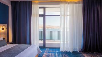 Premium bedding, desk, laptop workspace, soundproofing