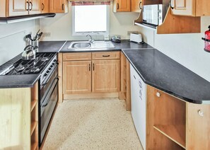 Oven - Comfortable caravan with one double and two twin. (Fishguard, Pembrokeshire)