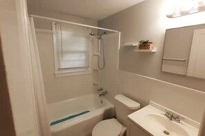 Hair dryer, towels, soap, shampoo