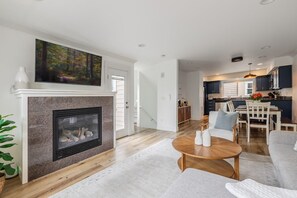 TV, fireplace - Modern 3BR in the Heart of Ballard | Private Patio (Seattle)