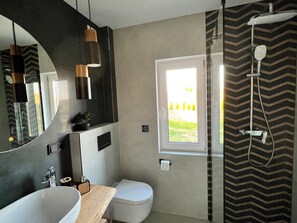 Shower, towels, soap, toilet paper