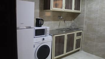 Superior Apartment, 3 Bedrooms | Private kitchen | Fridge, microwave, oven, rice cooker