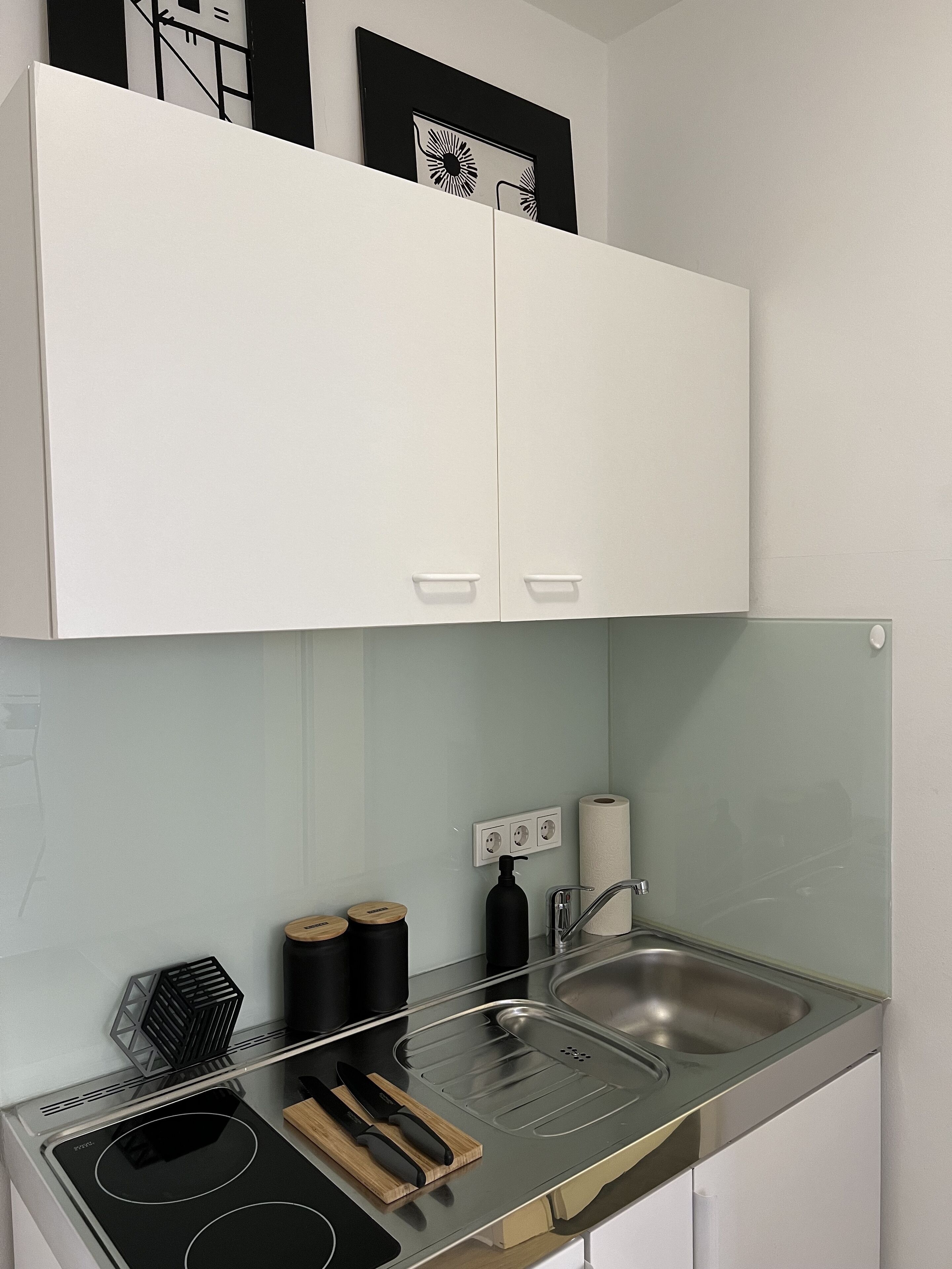 Fridge, stovetop, coffee/tea maker, cookware/dishes/utensils