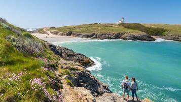 On the beach, sun loungers