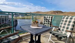 Outdoor dining - Lovingly furnished apartment DünenGras - located on the dunes (Julianadorp)