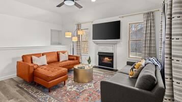 TV, fireplace, books, offices