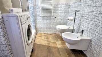 Hair dryer, bidet, towels, soap